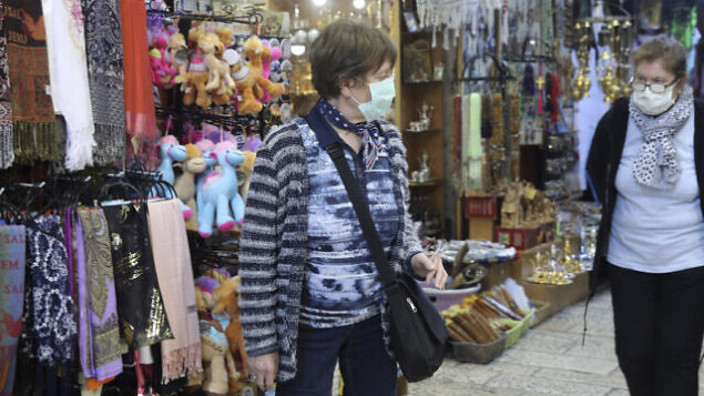 People wearing face masks visit in Jerusalem's old city, Friday, Feb. 28, 2020. (AP Photo/Mahmoud Illean) People wearing face masks visit in Jerusalem's old city, Friday, Feb. 28, 2020. (AP Photo/Mahmoud Illean)