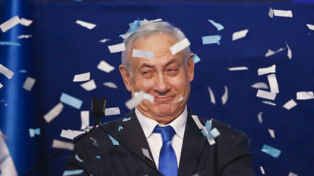 Israeli Prime Minister Benjamin Netanyahu smiles after first exit poll results for the Israeli elections at his party's headquarters in Tel Aviv, Israel, Monday, Feb. 2, 2020. (AP Photo/Ariel Schalit) Israeli Prime Minister Benjamin Netanyahu smiles after first exit poll results for the Israeli elections at his party's headquarters in Tel Aviv, Israel, Monday, Feb. 2, 2020. (AP Photo/Ariel Schalit)