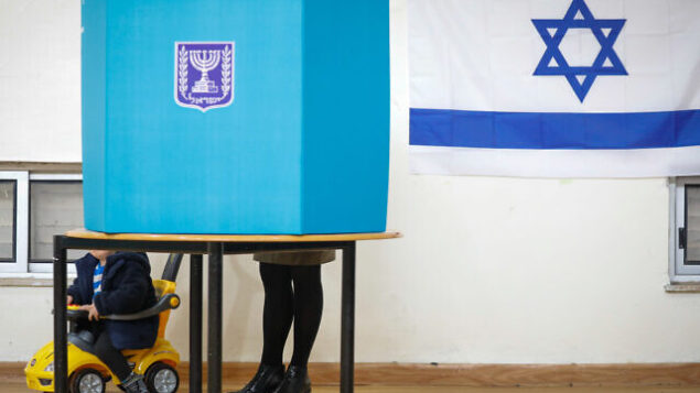 People cast their ballot at a voting station in Jerusalem, during the Knesset Elections, on March 2, 2020. Photo by Olivier Fitoussi/Flash90 *** Local Caption *** מצביע
בחירות
כנסת
הצבעה
קלפי People cast their ballot at a voting station in Jerusalem, during the Knesset Elections, on March 2, 2020. Photo by Olivier Fitoussi/Flash90 *** Local Caption *** מצביע
בחירות
כנסת
הצבעה
קלפי