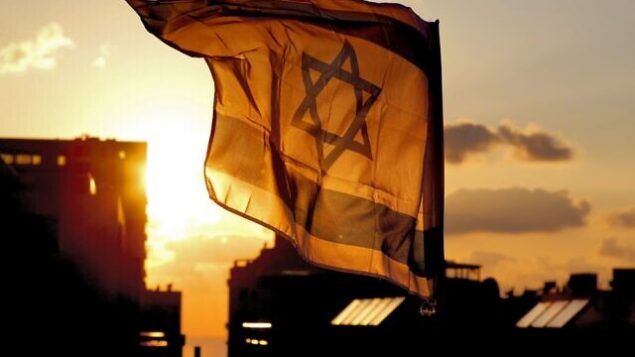 An Israeli flag is seen flying at sunset in the Israeli coastal city of Netanya on April 29, 2020, the anniversary of Israel's 72nd Independence Day corresponding to 5 Iyar according to the Jewish calendar. - As Israel celebrates its 72nd anniversary of the declaration of independence in 1948, the annual aviation performance over Israeli beaches has been cancelled and made into a solidarity flyover Israeli hospitals, during a national closure due to the novel coronavirus pandemic. (Photo by JACK GUEZ / AFP) An Israeli flag is seen flying at sunset in the Israeli coastal city of Netanya on April 29, 2020, the anniversary of Israel's 72nd Independence Day corresponding to 5 Iyar according to the Jewish calendar. - As Israel celebrates its 72nd anniversary of the declaration of independence in 1948, the annual aviation performance over Israeli beaches has been cancelled and made into a solidarity flyover Israeli hospitals, during a national closure due to the novel coronavirus pandemic. (Photo by JACK GUEZ / AFP)