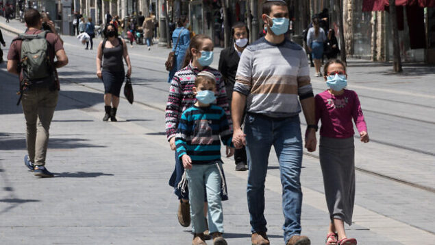People on Jaffa street in downtown Jerusalem on April 26, 2020. Photo by Nati Shohat/Flash90 *** Local Caption *** קורונה
ירושלים
רחוב יפו People on Jaffa street in downtown Jerusalem on April 26, 2020. Photo by Nati Shohat/Flash90 *** Local Caption *** קורונה
ירושלים
רחוב יפו