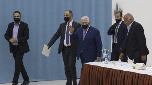 Palestinian President Mahmoud Abbas arrives to head the Palestinian leadership meeting at his headquarters, in the West Bank city of Ramallah, Tuesday, May 5, 2020. (AP Photo/Nasser Nasser, Pool) Palestinian President Mahmoud Abbas arrives to head the Palestinian leadership meeting at his headquarters, in the West Bank city of Ramallah, Tuesday, May 5, 2020. (AP Photo/Nasser Nasser, Pool)