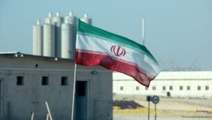 (FILES) In this file photo taken on November 10, 2019 an Iranian flag flutters in Iran's Bushehr nuclear power plant, during an official ceremony to kick-start works on a second reactor at the facility. - A magnitude 4.5 earthquake on Januray 8, 2020 rattled an area less than 50 kilometres (30 miles) from Iran's Bushehr nuclear power plant near the country's Gulf coast, a US monitor said. The quake, which had a depth of 10 kilometres, struck 17 kilometres south-southeast of Borazjan city at 6:49 am (0319 GMT), the US Geological Survey said on its website. State news agency IRNA said the earthquake was felt in Bushehr, site of the country's sole nuclear power plant. (Photo by ATTA KENARE / AFP)