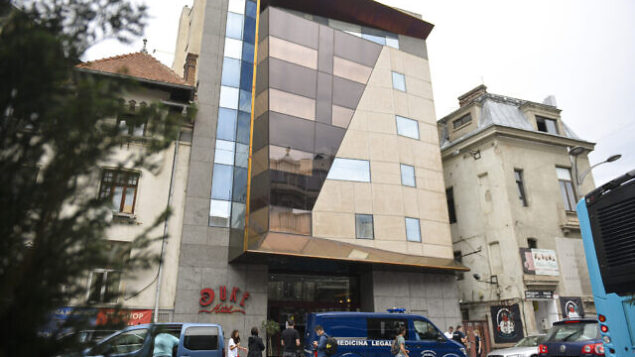 Police cars are parked outside the Duke Hotel where Gholamreza Mansouri died after falling from a high floor inside a hotel, in Bucharest, Romania, Friday, June 19, 2020. Gholamreza Mansouri, a former judge from Iran sought by his country to face corruption charges has died after falling from a high floor inside a hotel. Romanian police said only that a man had fallen from a high floor at a hotel in Bucharest, the Romanian capital, and was found dead. (AP Photo/Andreea Alexandru) Police cars are parked outside the Duke Hotel where Gholamreza Mansouri died after falling from a high floor inside a hotel, in Bucharest, Romania, Friday, June 19, 2020. Gholamreza Mansouri, a former judge from Iran sought by his country to face corruption charges has died after falling from a high floor inside a hotel. Romanian police said only that a man had fallen from a high floor at a hotel in Bucharest, the Romanian capital, and was found dead. (AP Photo/Andreea Alexandru)
