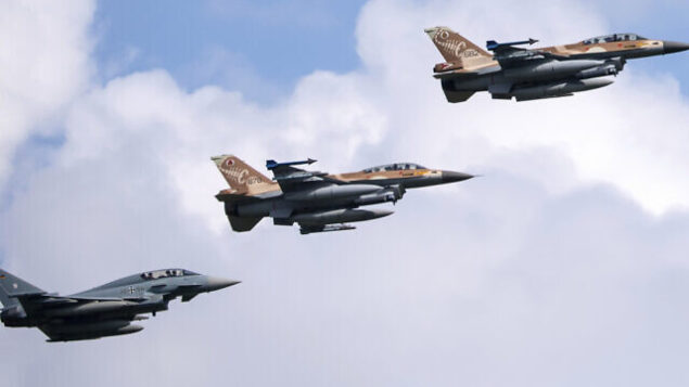 A German air force Bundeswehr Eurofighter and an Israeli Air Force F-16 jets fly in formation over the Fuerstenfeldbruck airbase in commemoration of the 1972 Olympic Games assassination attempt in Fuerstenfeldbruck, Germany, Tuesday, Aug. 18, 2020. The attempt to rescue the hostages failed at the airbase in Fuerstenfeldbruck in 1972and the hostages perished. It is the Israeli Air Force's first time conducting joint air combat exercises in Germany. (Sven Hoppe/dpa via AP)