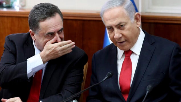 Israeli Prime Minister Benjamin Netanyahu, right, listens to Foreign Minister Israel Katz during the weekly cabinet meeting at his office in Jerusalem, Sunday, Oct. 27, 2019.  Israel's prime minister says he wants a "broad national unity government" amid political deadlock over forming a government following last month's elections. Speaking to his Cabinet, Benjamin Netanyahu said such a coalition is essential for Israel to face what he said were mounting security challenges around the region. (Gali Tibbon/Pool Photo via AP)