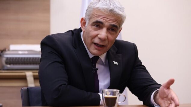 Israel's opposition leader Yair Lapid is pictured during an interview with Agence France-Presse (AFP)at his office in the Knesset, Israel's parliament, in Jerusalem, on September 14, 2020. - Israeli Prime Minister Benjamin Netanyahu has "no intention" of discussing peace with the Palestinians, Lapid told AFP ahead of the signing of landmark deals with the UAE and Bahrain. (Photo by Emmanuel DUNAND / AFP) Israel's opposition leader Yair Lapid is pictured during an interview with Agence France-Presse (AFP)at his office in the Knesset, Israel's parliament, in Jerusalem, on September 14, 2020. - Israeli Prime Minister Benjamin Netanyahu has "no intention" of discussing peace with the Palestinians, Lapid told AFP ahead of the signing of landmark deals with the UAE and Bahrain. (Photo by Emmanuel DUNAND / AFP)