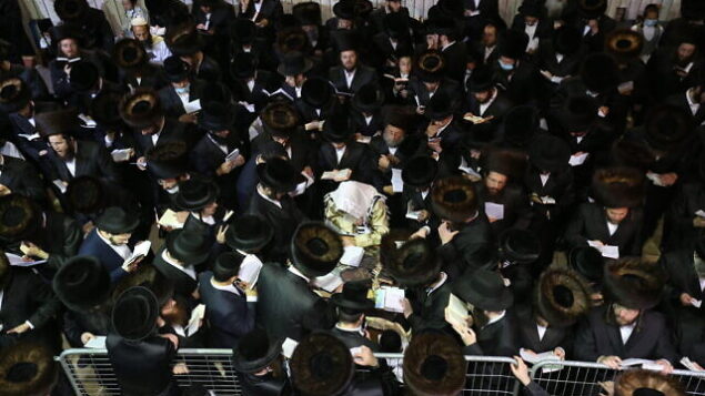 Rabbi Elimelech Biderman and ultra-Orthodox Jews pray for forgivness (Selichot) at the burial site of Rabbi Shimon bar Yochai in Meron, northern Israel, September 12, 2020, ahead of the Jewish New Year. Selichot are usually recited between midnight and dawn. Selichot services starts on the second day of the Hebrew month of Elul. Photo by David Cohen/Flash90 *** Local Caption ***