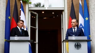 German Foreign Minister Heiko Maas and Israeli Foreign Minister Gabi Ashkenazi attend a news conference in front of the Liebermann Villa at the Wannsee lake in Berlin, Germany, August 27, 2020. (Michele Tantussi/Pool Photo via AP)