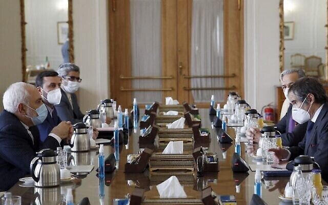 تصویر: محمدجواد ظریف وزیر خارجه ایران، چپ، حین ملاقات با رافائل گروسی، مدیرکل آژانس بین المللی انرژی اتمی IAEA، تهران، ۲۱ فوریه ۲۰۲۱. (AFP) تصویر: محمدجواد ظریف وزیر خارجه ایران، چپ، حین ملاقات با رافائل گروسی، مدیرکل آژانس بین المللی انرژی اتمی IAEA، تهران، ۲۱ فوریه ۲۰۲۱. (AFP)