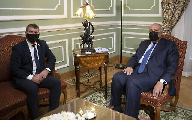 Egyptian Foreign Minister Sameh Shoukry meets with Israeli Foreign Minister Gabi Ashkenazi at the Tahrir Palace in Cairo, Egypt, Sunday, May 30, 2021. (AP Photo/Nariman El-Mofty) Egyptian Foreign Minister Sameh Shoukry meets with Israeli Foreign Minister Gabi Ashkenazi at the Tahrir Palace in Cairo, Egypt, Sunday, May 30, 2021. (AP Photo/Nariman El-Mofty)