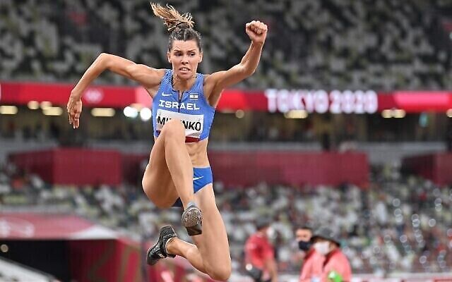 Israel's Hanna Minenko competes in the women's triple jump final during the Tokyo 2020 Olympic Games at the Olympic Stadium in Tokyo on August 1, 2021. (Photo by Andrej ISAKOVIC / AFP)