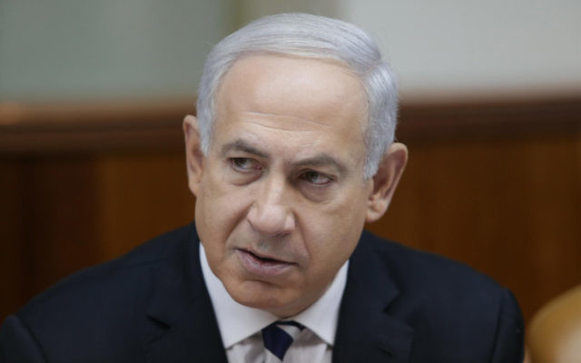 Le Premier Ministre israélien Benjamin Netanyahu (Crédit : Alex Kolomoisky/Flash90) Le Premier Ministre israélien Benjamin Netanyahu (Crédit : Alex Kolomoisky/Flash90)