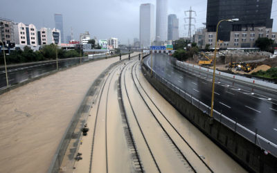 Flooded railway lines alongside the Ayalon River in Tel Aviv, Tuesday. Jan 8 2012. (Photo by Flash90)
