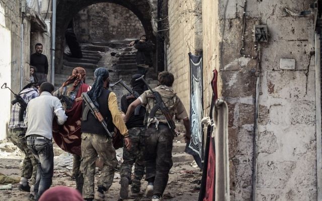 Des membres du Front al-Nosra, affilié à Al-Qaïda,  qui est l'un des groupes d'opposition en Syrie les plus puissants (Crédit photo: Wikicommons)