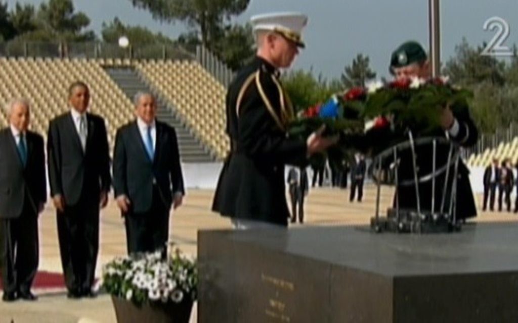 President Barack Obama, flanked by Prime Minister Netanyahu and President Shimon Peres, at the grave of Theodor Herzl on Mt. Herzl, March 22 (photo credit: Channel 2 screenshot)