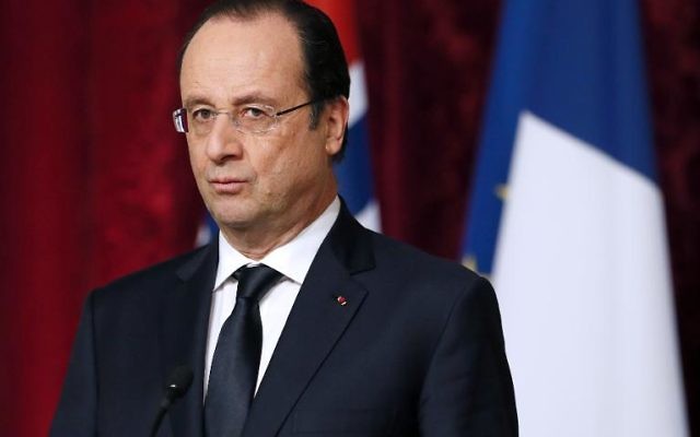 Le président François Hollande en conférence de presse, à Paris le 3 février 2014
(Crédit : AFP/Archives/Patrick Kovarik) Le président François Hollande en conférence de presse, à Paris le 3 février 2014
(Crédit : AFP/Archives/Patrick Kovarik)