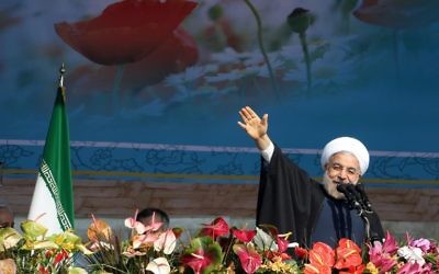 Le président iranien Hassan Rouhani à Téhéran, le 11 février 2014 (Crédit : AFP/Atta Kenare)