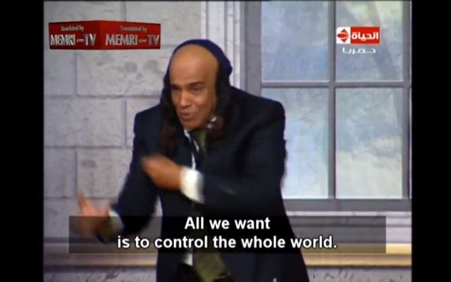 "Tout ce que nous voulons est contrôler le monde". Un personnage de la pièce de théâtre intitulée "L'Espion", Binyamin (Crédit : capture d'écran youtube/Institut de recherche sur les médias au Moyen Orient-MEMRI) "Tout ce que nous voulons est contrôler le monde". Un personnage de la pièce de théâtre intitulée "L'Espion", Binyamin (Crédit : capture d'écran youtube/Institut de recherche sur les médias au Moyen Orient-MEMRI)
