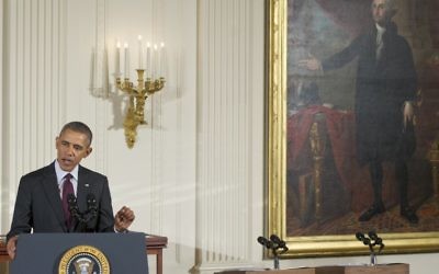 Le président américain Barack Obama prononce un discours à la Maison Blanche, le 18 mars 2014 (Crédit : AFP PHOTO/Saul LOEB)