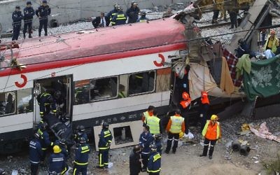 Scène de l'attentat de Madrid du 11 mars 2004 (Crédit  : Pierre Philippe Marcou/AFP)