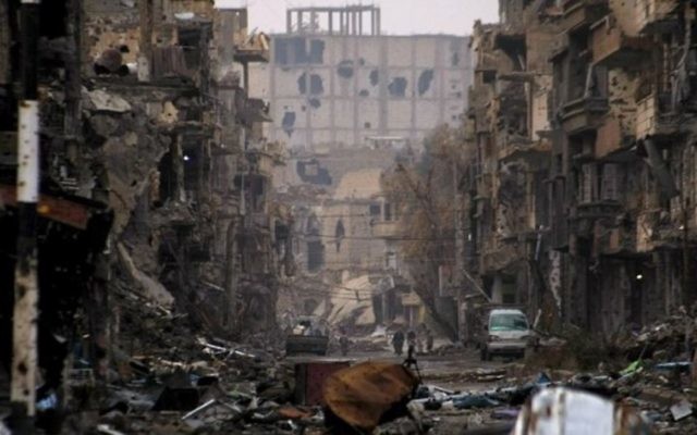 Une rue de Syrie ravagée par la guerre, en 2014. (Crédit : AFP) Une rue de Syrie ravagée par la guerre, en 2014. (Crédit : AFP)