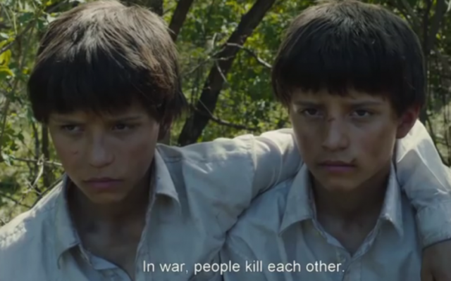 Les deux personnages principaux du film "Le grand cahier", adaptaion du roman de l'écrivain Agota Kristof (Crédit : capture d'écran Youtube) Les deux personnages principaux du film "Le grand cahier", adaptaion du roman de l'écrivain Agota Kristof (Crédit : capture d'écran Youtube)