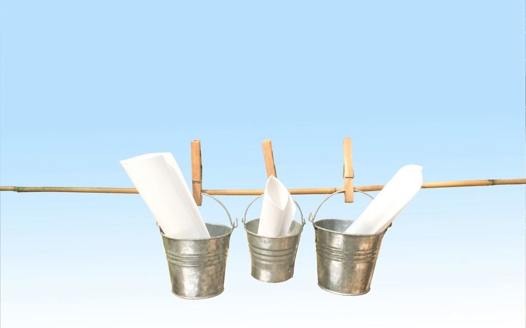 http://www.shutterstock.com/pic-164628755/stock-photo-concept-three-galvanized-buckets-pegged-on-bamboo-stick-with-blue-background.html?src=pp-same_artist-164628665-xNI9eNZRC0j71W4HrTzsKw-1
