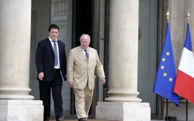 Gil Taieb (g) et Roger Cukierman sortant de l'Élysée, en juillet 2014 (Crédit : AFP)