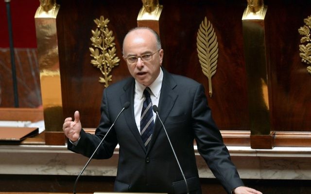Bernard Cazeneuve à l'Assemblée nationale. (Crédit : Pierre Andrieu/AFP) Bernard Cazeneuve à l'Assemblée nationale. (Crédit : Pierre Andrieu/AFP)