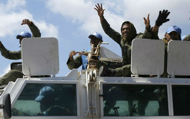 Des Casques bleus fidjiens de la Force des Nations Unies chargée d'observer le dégagement (FNUOD), le 15 septembre 2014. (Crédit : AFP/Jalaa Marey) Des Casques bleus fidjiens de la Force des Nations Unies chargée d'observer le dégagement (FNUOD), le 15 septembre 2014. (Crédit : AFP/Jalaa Marey)