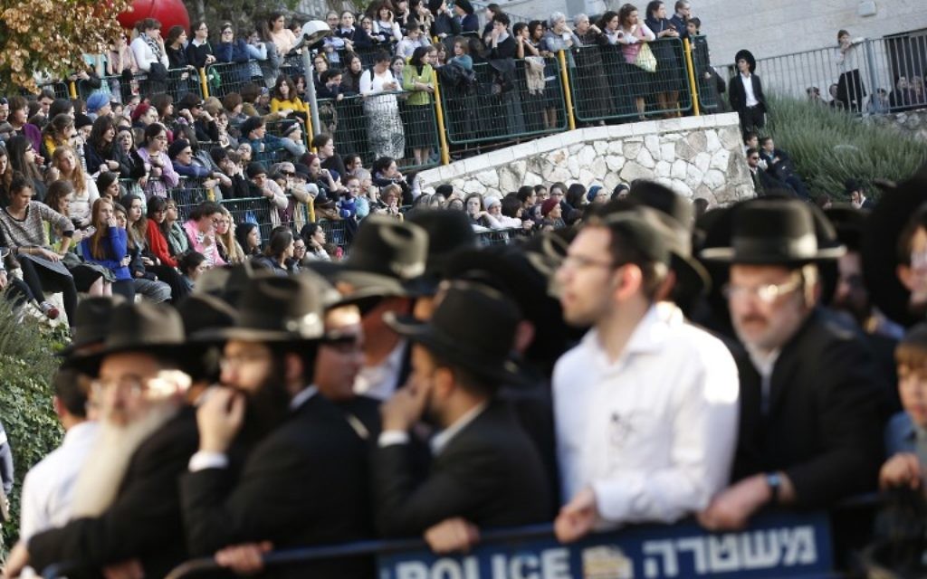 Funérailles des 4 rabbins assassinés à Har Nof (Crédit : AFP) Funérailles des 4 rabbins assassinés à Har Nof (Crédit : AFP)