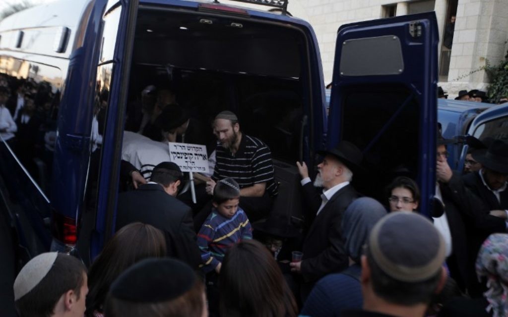 Funérailles des 4 rabbins assassinés à Har Nof (Crédit : AFP) Funérailles des 4 rabbins assassinés à Har Nof (Crédit : AFP)