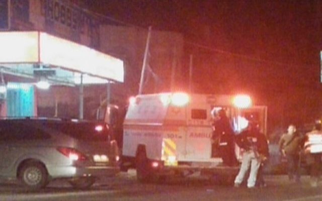 Scène de l'attaque à la voiture bélier au Gush Etzion - 5 novembre 2014 (Crédit : capture d'écran Deuxième chaîne)