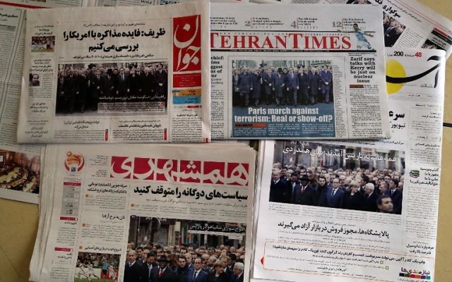 Les Unes des journaux iraniens au lendemain de la publication des récentes caricatures par Charlie Hebdo (Crédit : ATTA KENARE / AFP)