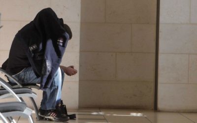 Des suspects dans l'affaire de corruption impliquant Yisrael Beytenu le 25 décembre 2014 (Crédit : Flash90)