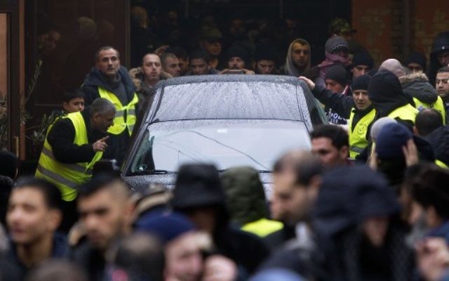 500 personnes à l'enterrement du terroriste de Copenhague (Crédit : NILS MEILVANG / SCANPIX DENMARK / AFP) 500 personnes à l'enterrement du terroriste de Copenhague (Crédit : NILS MEILVANG / SCANPIX DENMARK / AFP)