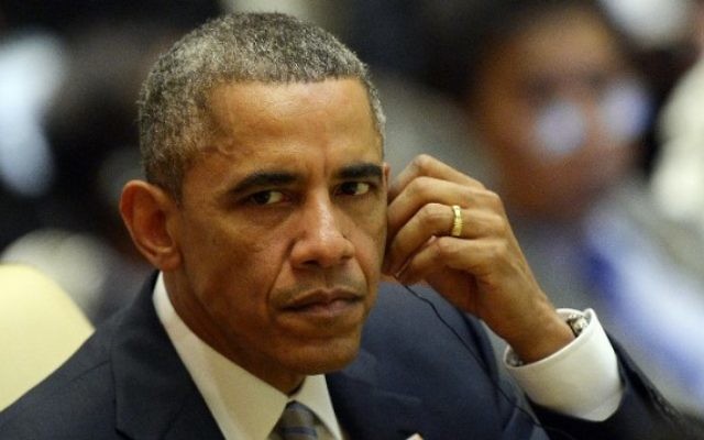 Le président américain Barack Obama, le 13 novembre 2014 (Crédit : AFP/Christophe Archambault) Le président américain Barack Obama, le 13 novembre 2014 (Crédit : AFP/Christophe Archambault)