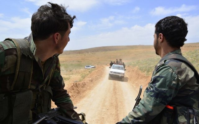 Les forces du régime syrien le 9 mai 2015 dans la région de Qalamun. (Crédit : AFP PHOTO / STR)