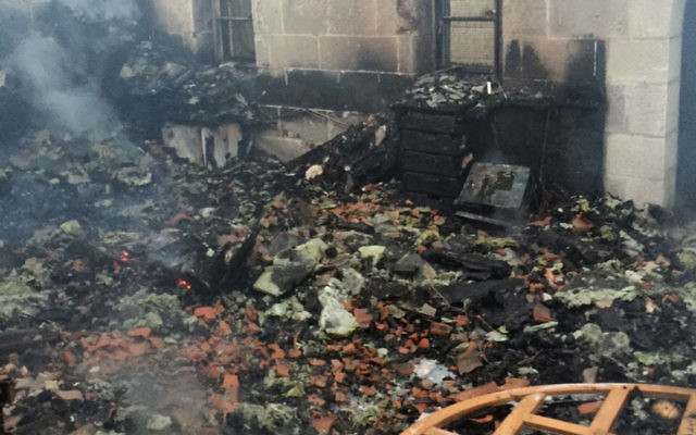 Lendemain d'un incendie criminel présumé à l'Eglise de la Multiplication au bord du lac de Tibériade, le jeudi 18 juin 2015 (Photo: Services des pompiers et de sauvetage)