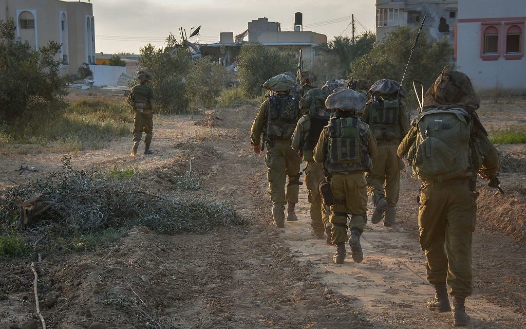 Des soldats de Tsahal dans la bande de Gaza pendant l'Opération Bordure protectrice l'été 2014 (Crédit : Unité du porte-parole Tsahal / Flickr) Des soldats de Tsahal dans la bande de Gaza pendant l'Opération Bordure protectrice l'été 2014 (Crédit : Unité du porte-parole Tsahal / Flickr)