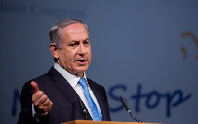 Le Premier ministre Benjamin Netanyahu lors de la conférence du 37e Congrès sioniste mondial au Convention Center de Jérusalem, le 20 octobre 2015. (Crédit phoro : Yonatan Sindel / Flash90) Le Premier ministre Benjamin Netanyahu lors de la conférence du 37e Congrès sioniste mondial au Convention Center de Jérusalem, le 20 octobre 2015. (Crédit phoro : Yonatan Sindel / Flash90)