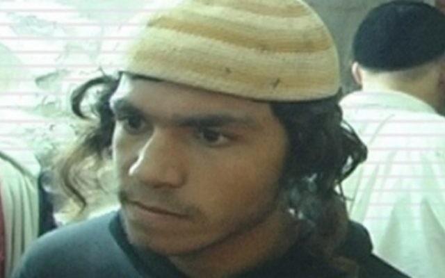 Amiram Ben-Uliel, qui a été inculpé dimanche 3 janvier 2016, pour assassinat dans les meurtres de la famille Dawabsha à Duma (Autorisation)