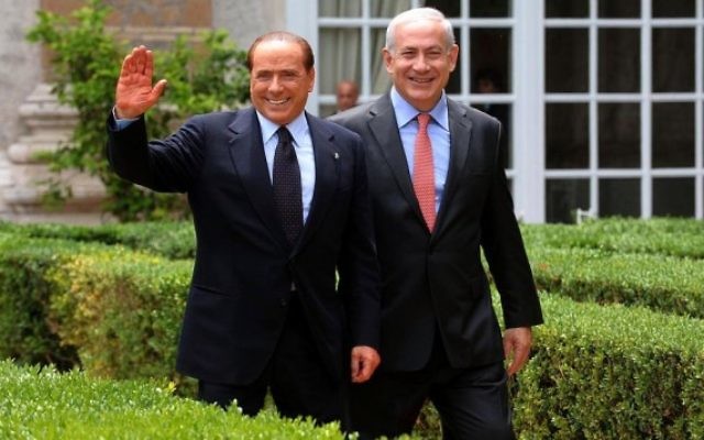 Benjamin Netanyahu, à droite, avec le Premier ministre italien d'alors, Silvio Berlusconi à Rome le 13 juin 2011. (Crédit : Amos Ben Gershom / GPO/FLASH90) Benjamin Netanyahu, à droite, avec le Premier ministre italien d'alors, Silvio Berlusconi à Rome le 13 juin 2011. (Crédit : Amos Ben Gershom / GPO/FLASH90)