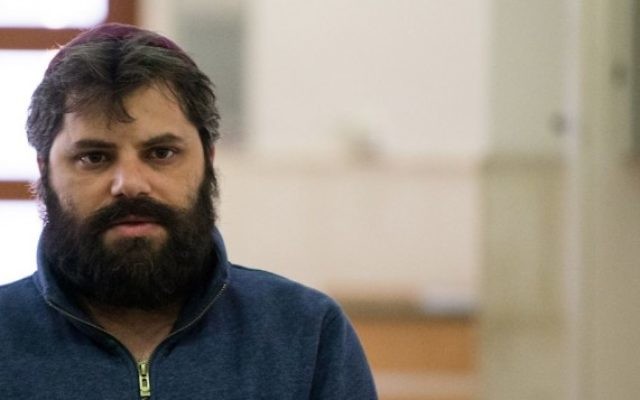 Yosef Haim Ben David, le troisième accusé du meurtre de Mohammad Abu Khdeir, à la cour du district de Jérusalem, le 5 avril 2016. (Crédit : Yonatan Sindel/Flash90)