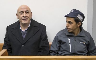 Le député arabe Basel Ghattas lors d'une audience consacrée à sa détention préventive au tribunal de Rishon Lezion, le 23 décembre 2016. (Crédit : Jack Guez/AFP)