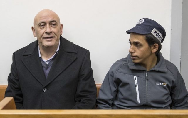 Le député arabe Basel Ghattas lors d'une audience consacrée à sa détention préventive au tribunal de Rishon Lezion, le 23 décembre 2016. (Crédit : Jack Guez/AFP) Le député arabe Basel Ghattas lors d'une audience consacrée à sa détention préventive au tribunal de Rishon Lezion, le 23 décembre 2016. (Crédit : Jack Guez/AFP)