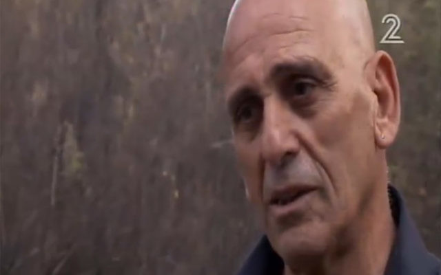 Herzl Aharon, responsable de l'enquête sur les incendies qui ont balayé Israël en novembre 2016. (Crédit : capture d'écran Deuxième chaîne) Herzl Aharon, responsable de l'enquête sur les incendies qui ont balayé Israël en novembre 2016. (Crédit : capture d'écran Deuxième chaîne)