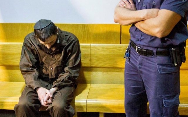 Meir Ephraim Goldstein, soupçonné d'avoir décapité son ex-femme et tenté de brûler son corps à Tibériade, devant la cour des magistrats de Nazareth, le 30 mars 2017. (Crédit : Flash90) Meir Ephraim Goldstein, soupçonné d'avoir décapité son ex-femme et tenté de brûler son corps à Tibériade, devant la cour des magistrats de Nazareth, le 30 mars 2017. (Crédit : Flash90)