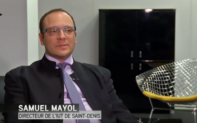 Samuel Mayol, en 2015, interrogé par ITele, sur l'affaire qui agite l'université Saint-Denis (Crédit: capture d'écran Youtube/ITele) Samuel Mayol, en 2015, interrogé par ITele, sur l'affaire qui agite l'université Saint-Denis (Crédit: capture d'écran Youtube/ITele)